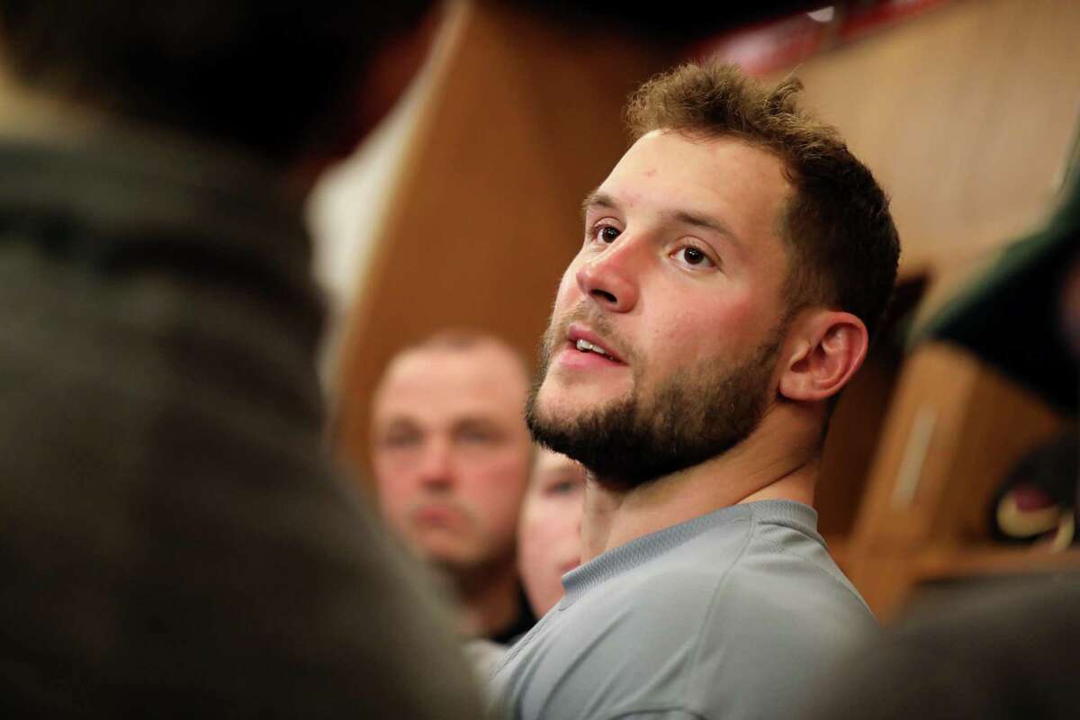 Nick Bosa, a defensive end for the San Francisco 49ers, takes questions from members of the news media inside the 49ers’ locker room at Levi’s Stadium in Santa Clara, Calif., Tuesday, Jan. 31, 2023.