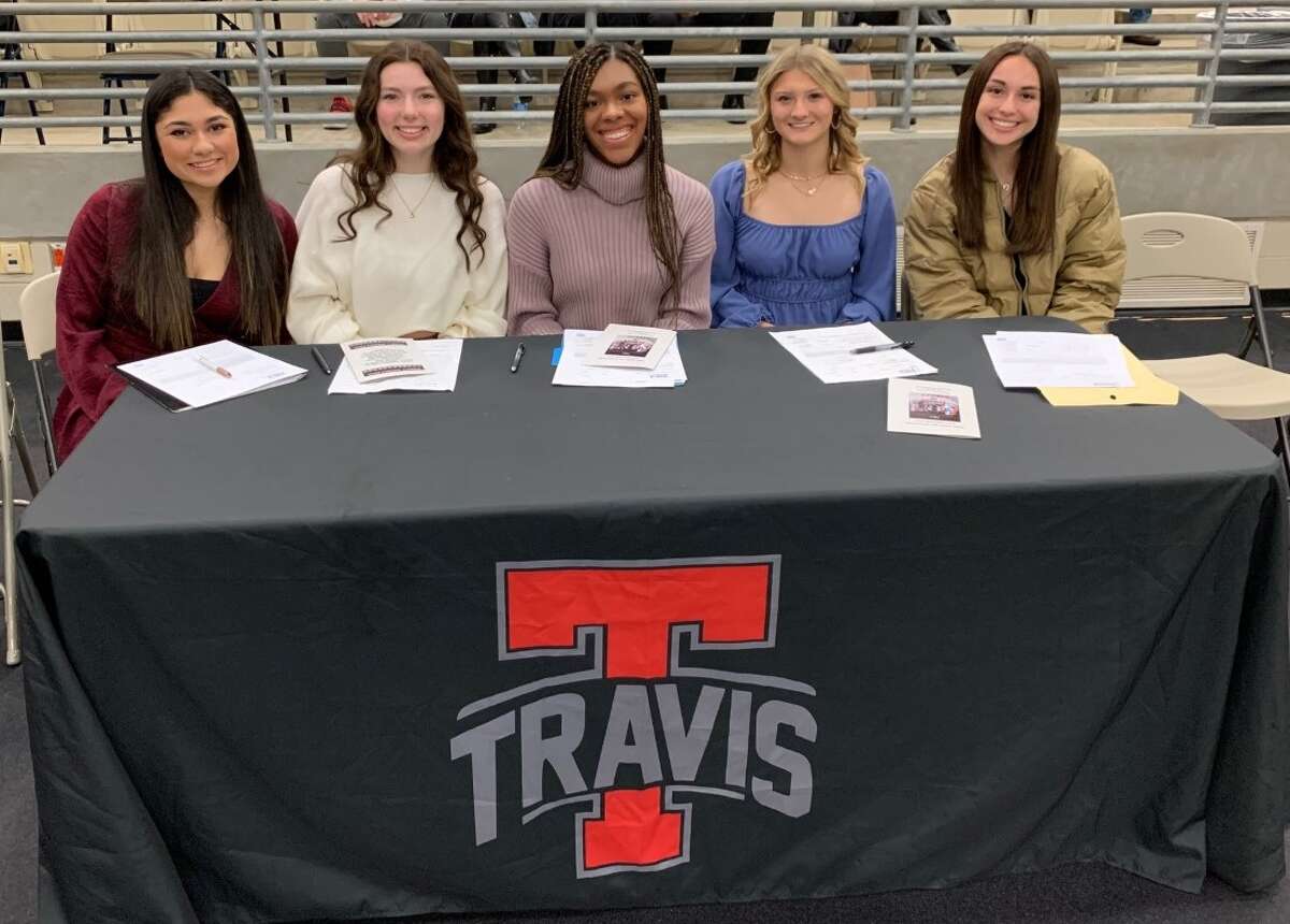 Student-athletes from Travis High School take part in Fort Bend ISD's National Signing Day celebration, Feb. 1 at Hopson Field House in Missouri City.