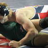 Big Rapids' Brody Sleeper, at 165 pounds, works on his Comstock Park opponent and would win by pin in Wednesday action
