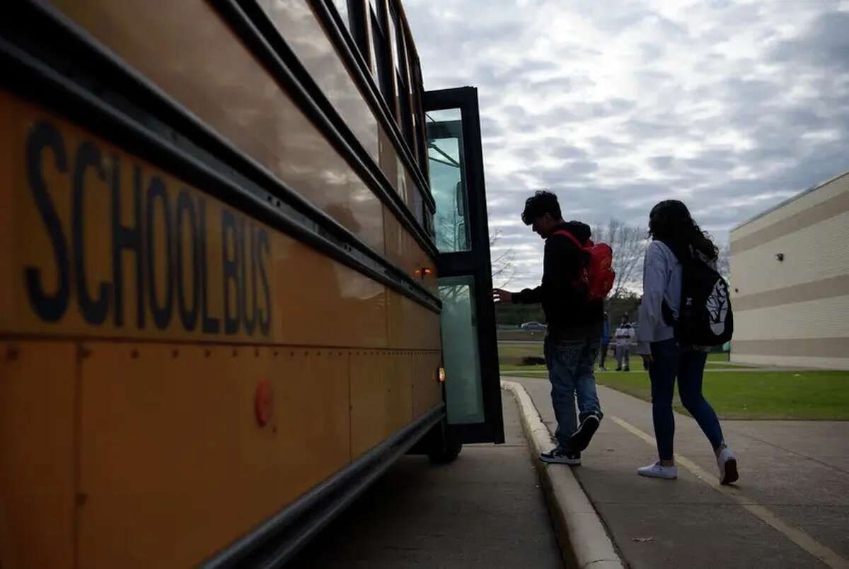 Students get on a bus after classes at Lufkin High School on Jan. 27, 2023.