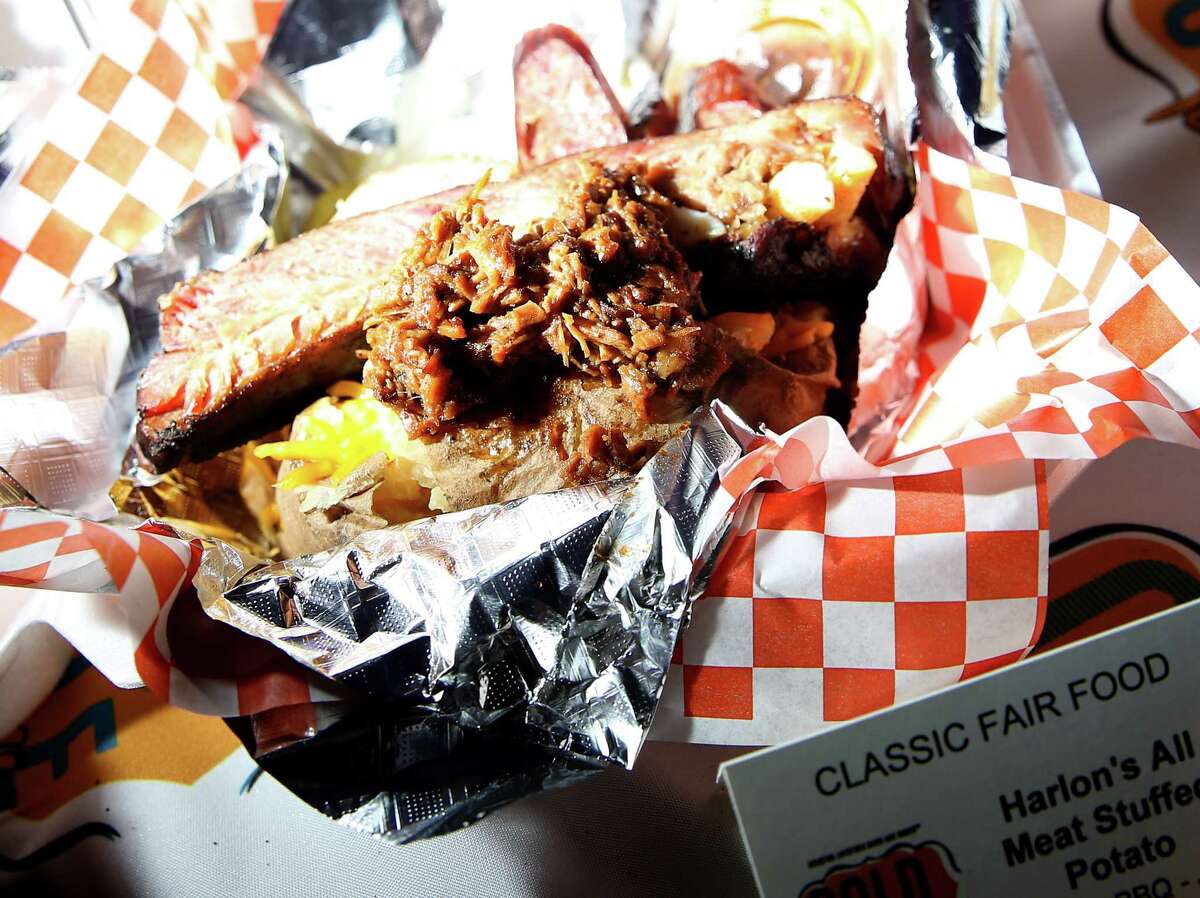 An all-meat stuffed baked potato from Harlon's BBQ was an entry in the Gold Buckle Foodie Awards, an example of classic fair food, at the 2022 Houston Livestock Show and Rodeo.