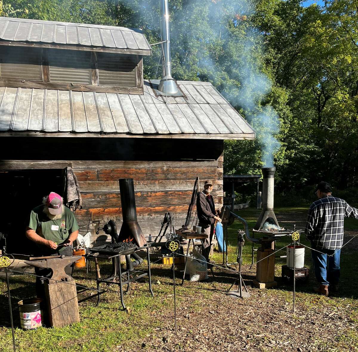 Max Carey Blacksmith Guild members work at a public event in October 2022.