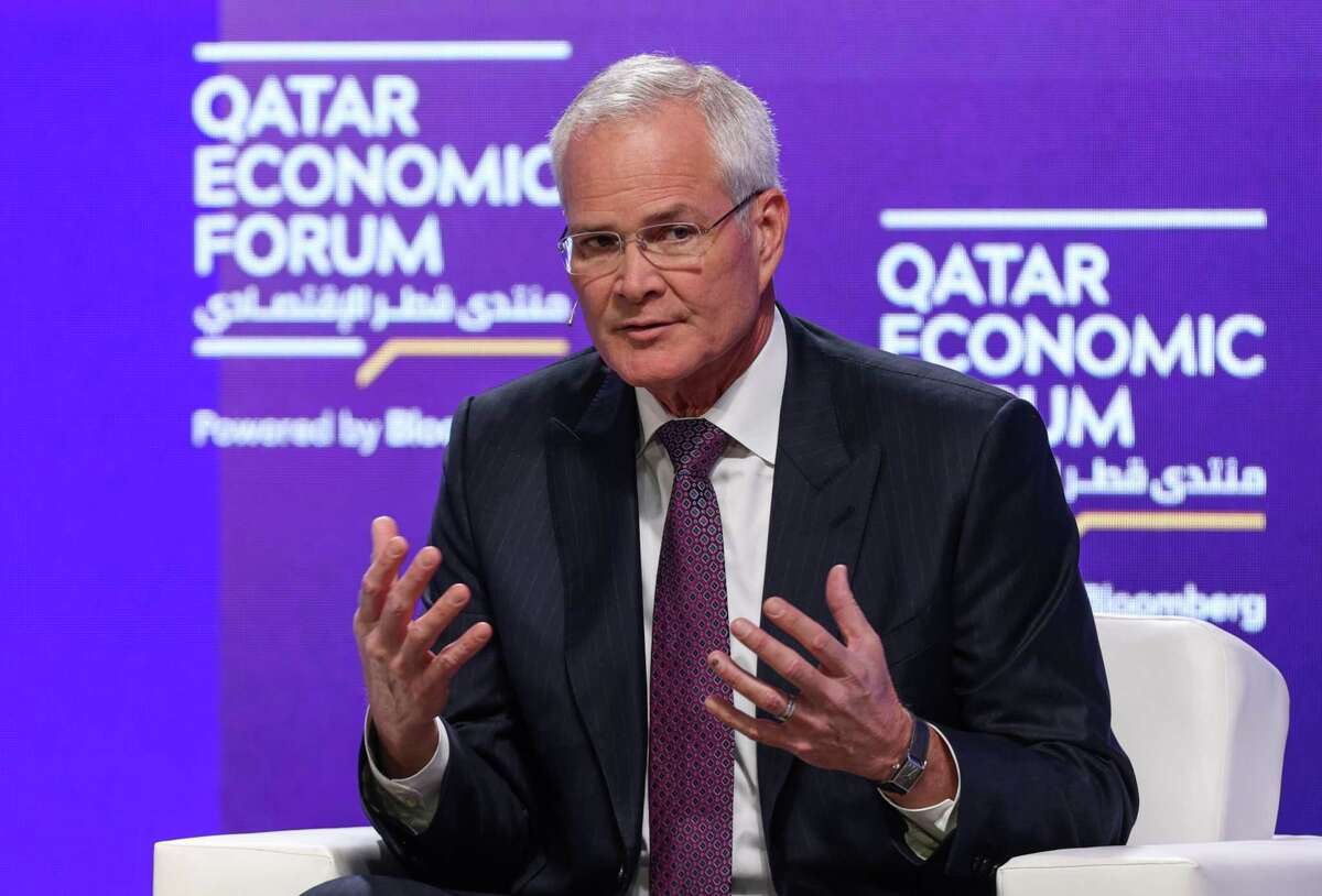 Exxon CEO Darren Woods speaks during a panel session at the Qatar Economic Forum in Doha, Qatar, last June. MUST CREDIT: Bloomberg photo by Christopher Pike