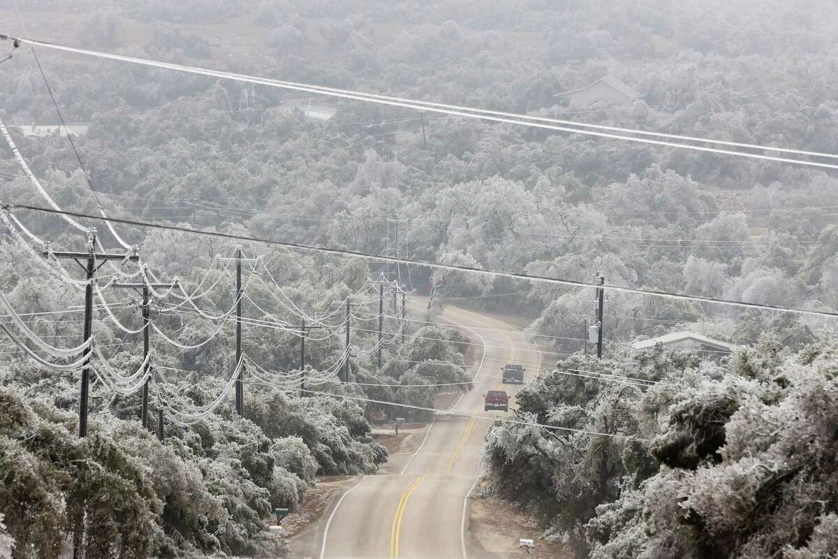 Ice laden trees are seen throughout the area around Bulverde, Texas, including along Sun Valley Drive, Thursday, Feb. 2, 2023. The weight of the ice cause severe damage to trees throughout the area.