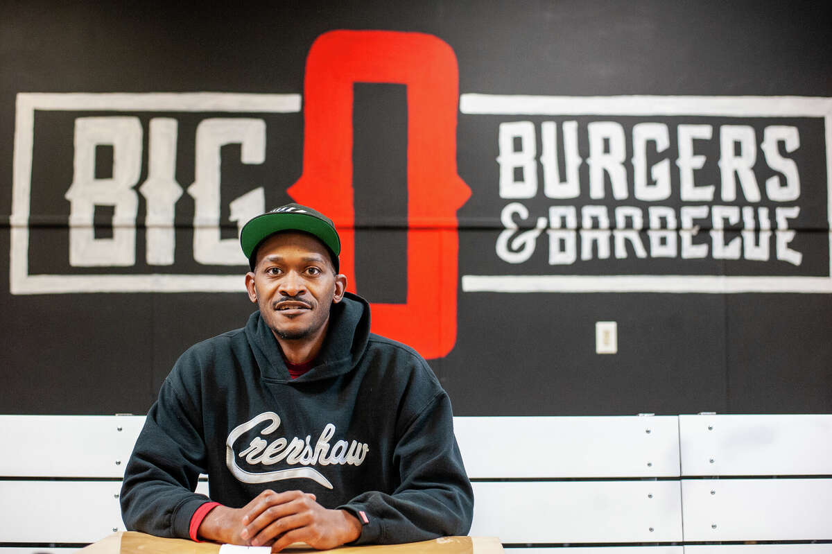 Big-O-Burgers and Barbecue owner Omar Linder poses in his new location on Feb. 2, 2023 at 111 W. Wackerly St. in Midland.