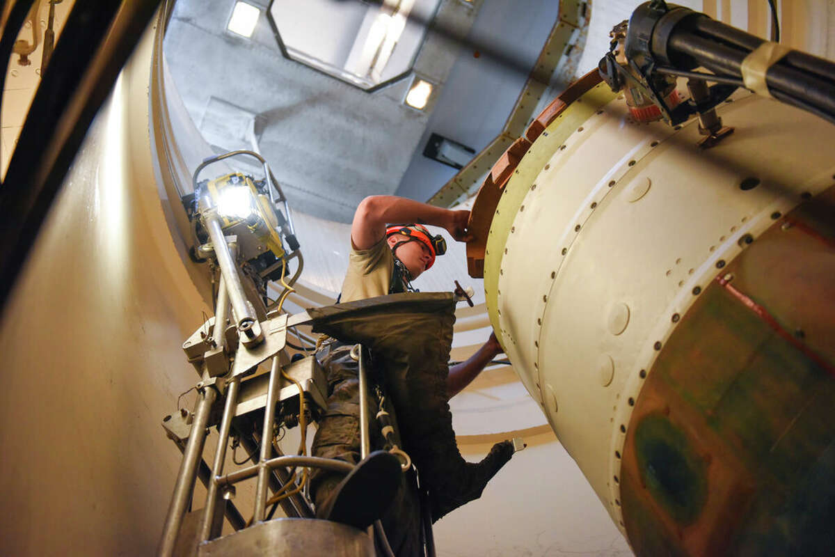 Airman 1st Class Jackson Ligon, 341st Missile Maintenance Squadron technician, prepares a spacer on an intercontinental ballistic missile during a simulated Minuteman test at a launch facility near Malmstrom Air Force Base in Great Falls, Montana. The U.S. says it is tracking a suspected Chinese surveillance balloon that has been spotted over U.S. airspace for a couple of days, including Montana, which is home to one of the nation's three nuclear missile silo fields at Malmstrom Air Force Base.