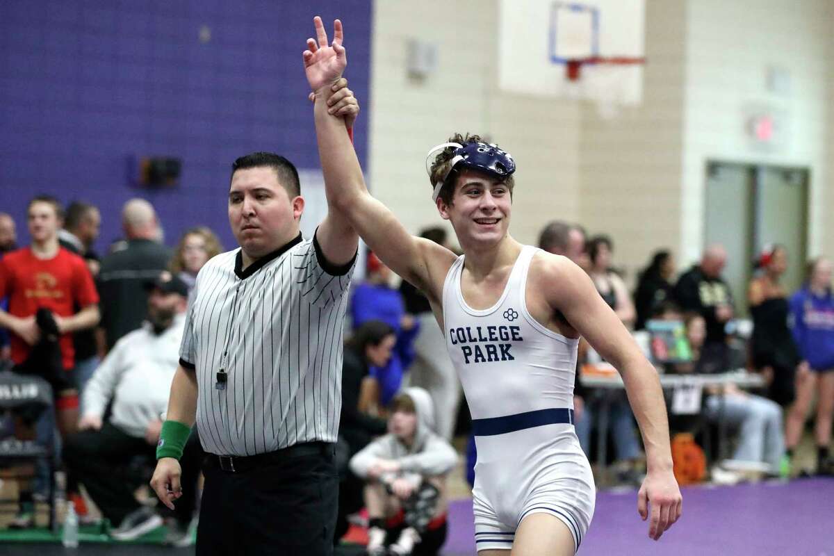 Kales Smith of College Park reacts after defeating Diego Suarez of Caney Creek after winning his boys 132-pound championship bout during the District 8-6A Wrestling Championships at Lynn Lucas Middle School, Thursday, Feb. 2, 2023, in Willis.