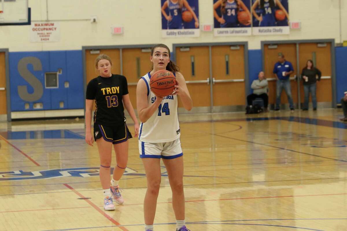 Natasha Chudy of Saratoga Springs shoots a free throw in a game earlier this season, her fifth on the varsity. She is averaging  19.8 points, 13.1 rebounds and 5.4 assists this season.