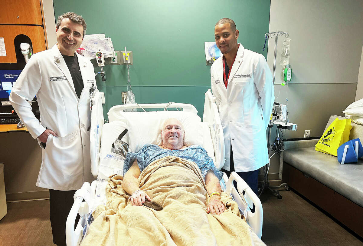 Doctors Robert Salazar and Marloe Prince, interventional cardiologists at HCA Houston Healthcare Kingwood visit their patient Jerome Happ who was fortunate enough to survive two heart attack incidents in less than a month.