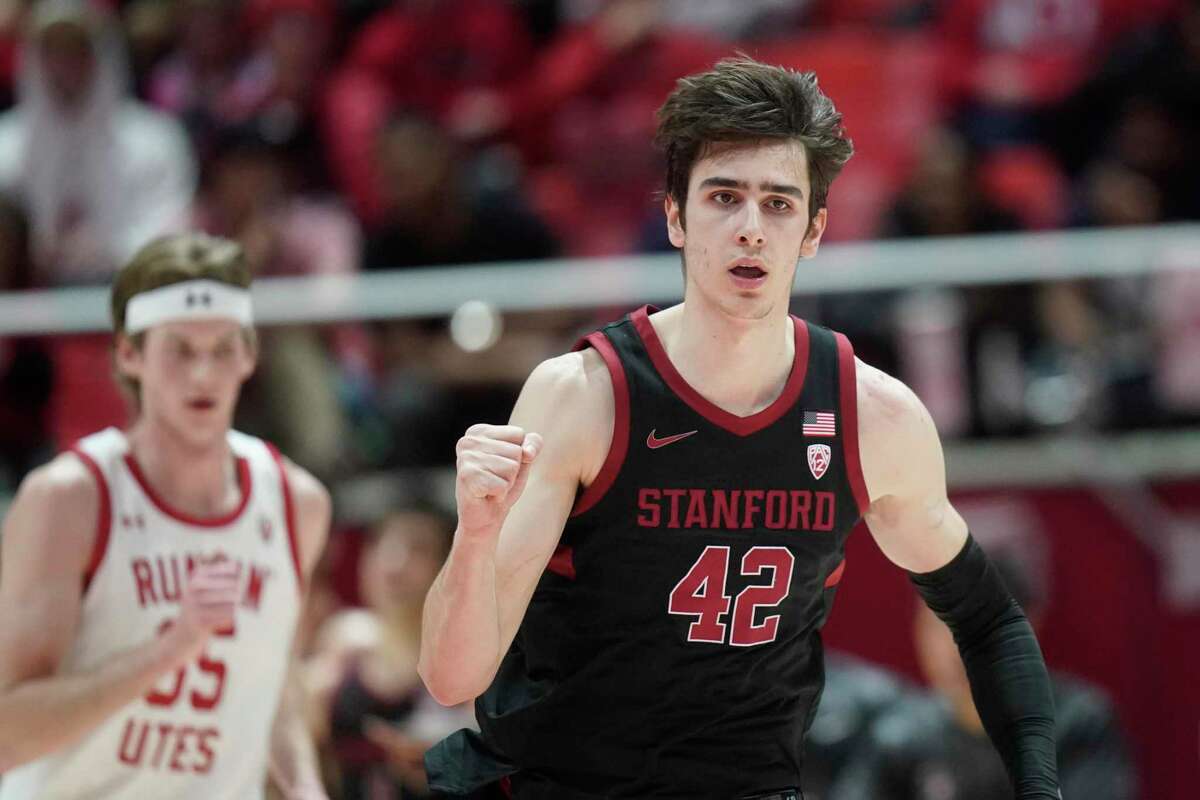 Stanford forward Maxime Raynaud (42) reacts after making a 3-point basket against Utah during the second half of an NCAA college basketball game Thursday, Feb. 2, 2023, in Salt Lake City. (AP Photo/Rick Bowmer)