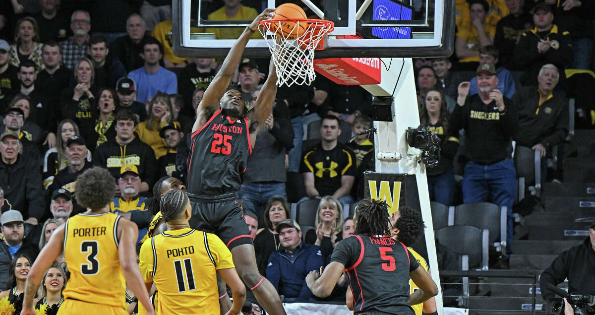 Jarace Walker #25 of the Houston Cougars dunks the ball in the first half against the Wichita State Shockers at Charles Koch Arena on February 2, 2023 in Wichita, Kansas. (Photo by Peter Aiken/Getty Images)