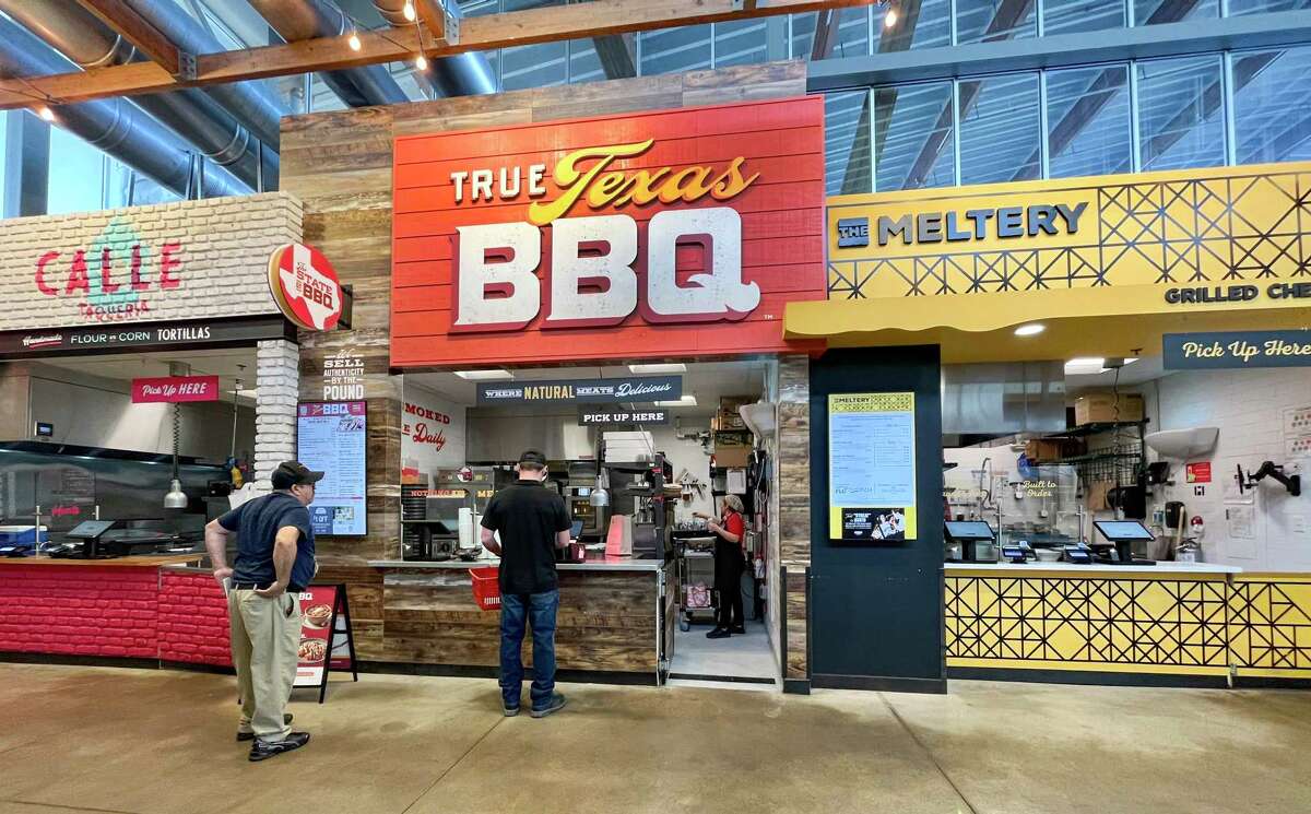 Foods like tacos, barbecue, grilled cheese sandwiches and sushi are available at Main Street in the H-E-B in Austin’s Mueller district. It's an example of things H-E-B is doing to bring people to its site as a destination and not merely a grocery store.