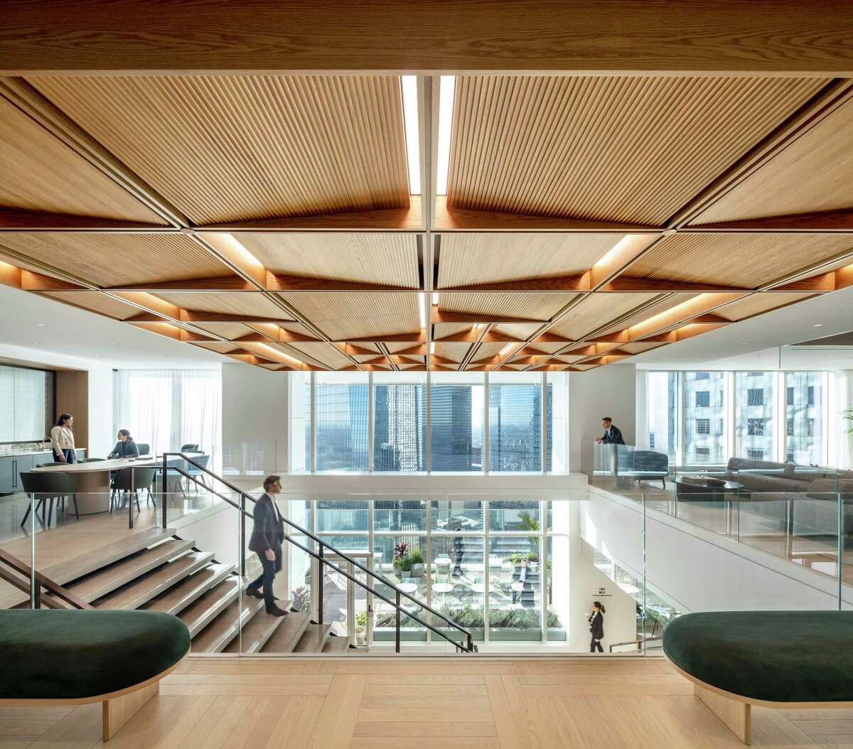 Hines' new headquarters in Texas Tower combine natural materials such as wood, glass and steel, and modern furnishings are found throughout.