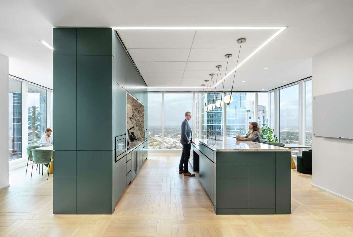 Each of Hines six floors has a break room or lunch room similar to this one, with space for heating food or eating more casually or more formally as shown at the dining table at left. 
