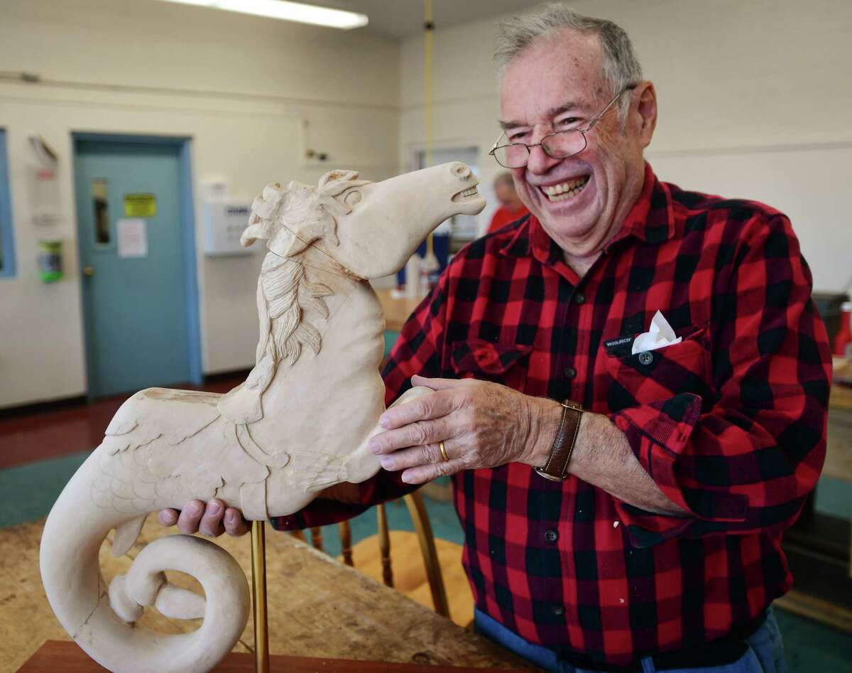 Don Lamberty, of Fairfield, makes a scale version of a Hippocampus vintage carousel horse in woodcarving class at the Bigelow Center for Senior Activities in Fairfield, Conn. on Friday, February 3, 2023.