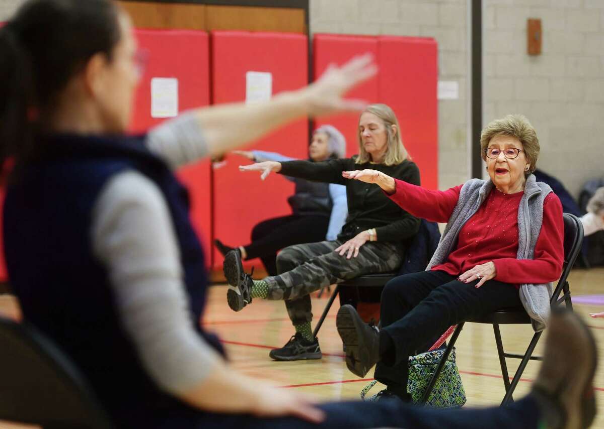Instructor Lauren Lanham, left, leads the twice weekly Body Balance exercise class at the Bigelow Center for Senior Activities in Fairfield, Conn. on Friday, February 3, 2023.