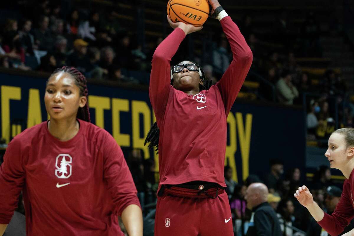 Fran Belibi of the Stanford Cardinal shoots during warm ups before taking on cross Bay rival UC Berkeley in Berkeley, California on Sunday, January 8, 2023.