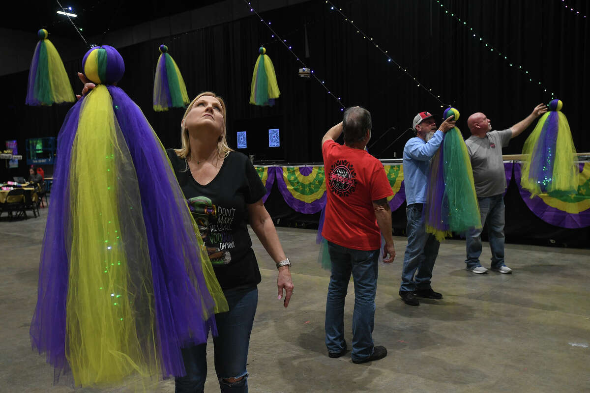 Donna Quebedeaux with Southeast Texas Circle of Hope helps decorate the Civic Center for the 8th Annual Pardi Gras, the non-profit service organization's yearly fundraiser. Photo made Friday, February 3, 2023 Kim Brent/Beaumont Enterprise