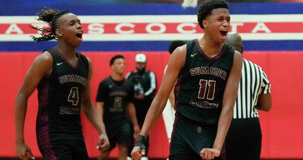 Summer Creek's Cameron Patterson (11) and Bryson Wheatfall (4) celebrate the team's win over Atascocita in a high school basketball game, Saturday, Jan. 14, 2023, in Humble.