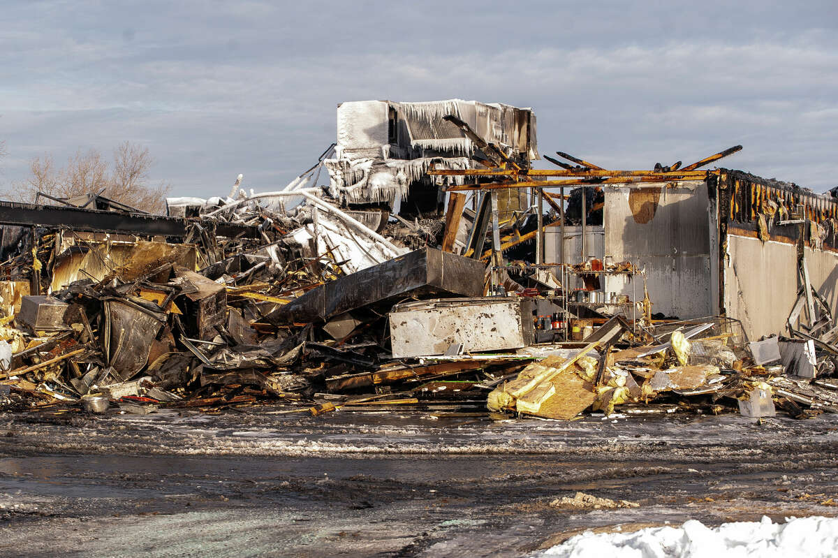 Rubble sits where the former Genji Japanese Steakhouse stood after being burnt down on Feb. 4, 2022 in Midland.