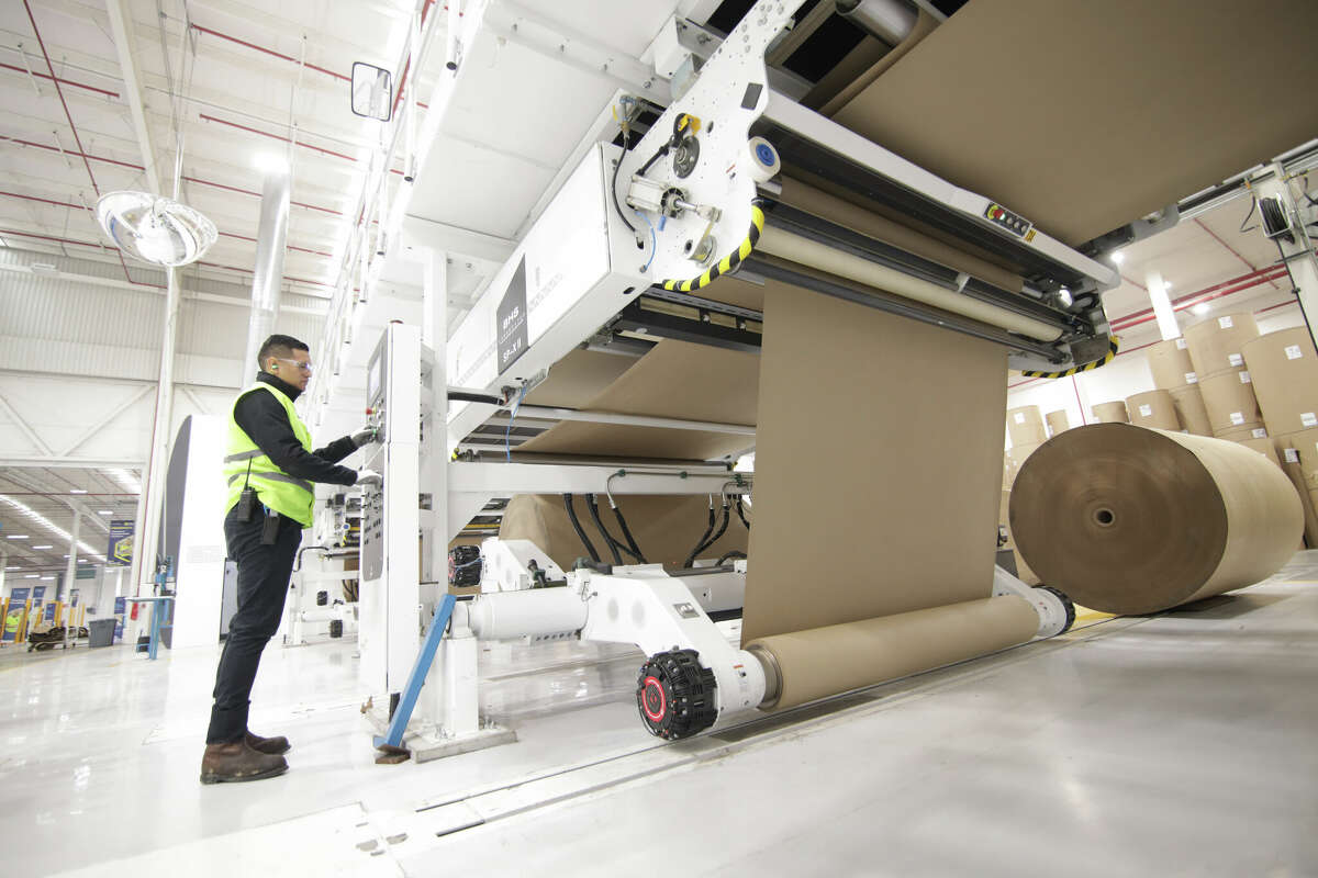 An operator works on the High Tech Corrugator machine at the new Smurfit Kappa plant in Nuevo Laredo, Mexico, on Jan. 31, 2023.