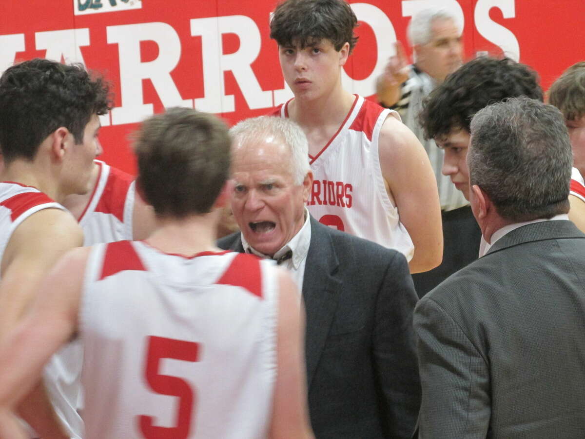 Wamogo coach Gregg Hunt pours intensity into his team in a come-from behind win over Northwestern for the Berkshire League lead at Wamogo High School Friday night. 