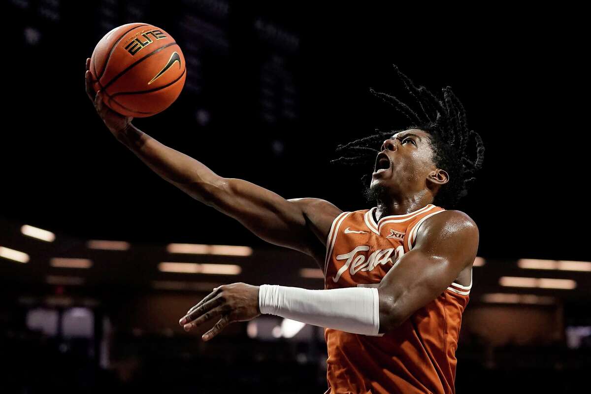 Texas guard Marcus Carr puts up a shot during the first half of an NCAA college basketball game against Kansas State Saturday, Feb. 4, 2023, in Manhattan, Kan. (AP Photo/Charlie Riedel)