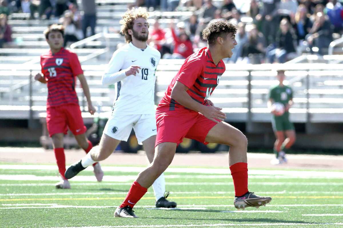 The Woodlands' Henrique Caputo (10) reacts after scoring a goal during a District 13-6A high school soccer match at The Woodlands High School, Saturday, Feb. 4, 2023, in The Woodlands.