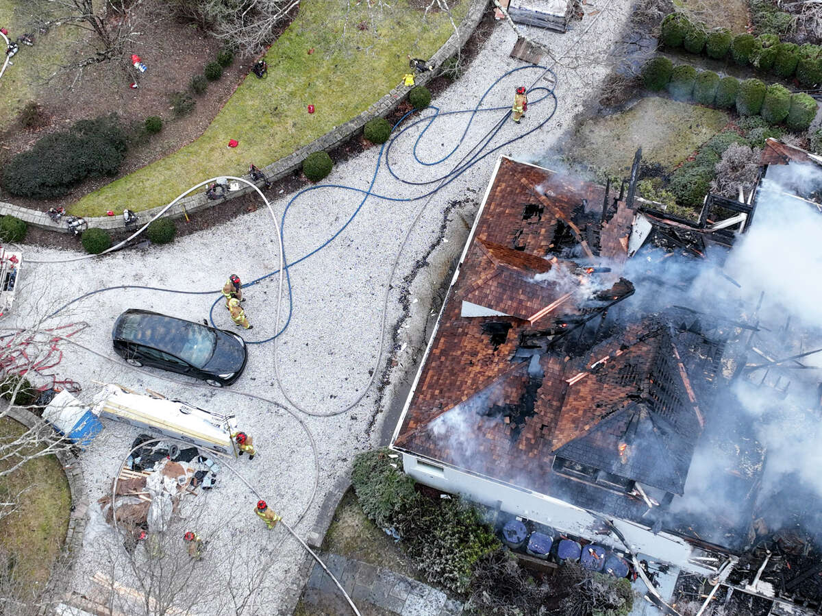 Cold added challenges to double house fire in Weston