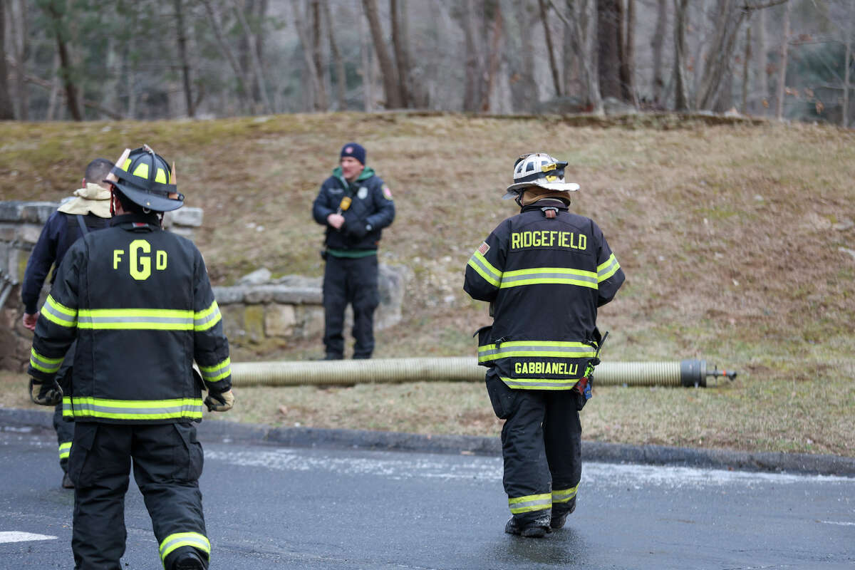 Cold added challenges to double house fire in Weston