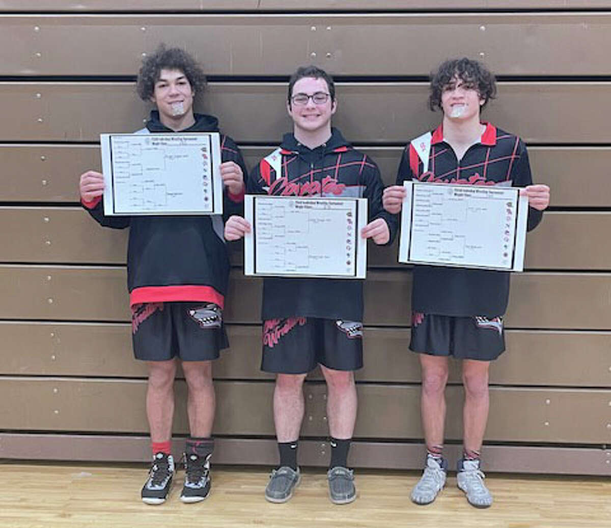 Reed City had three cpnference champion wrestlers with (left to right) Bryson Hughes at 190, Noah Morgan at 215 and Izaiah Lentz at 144.