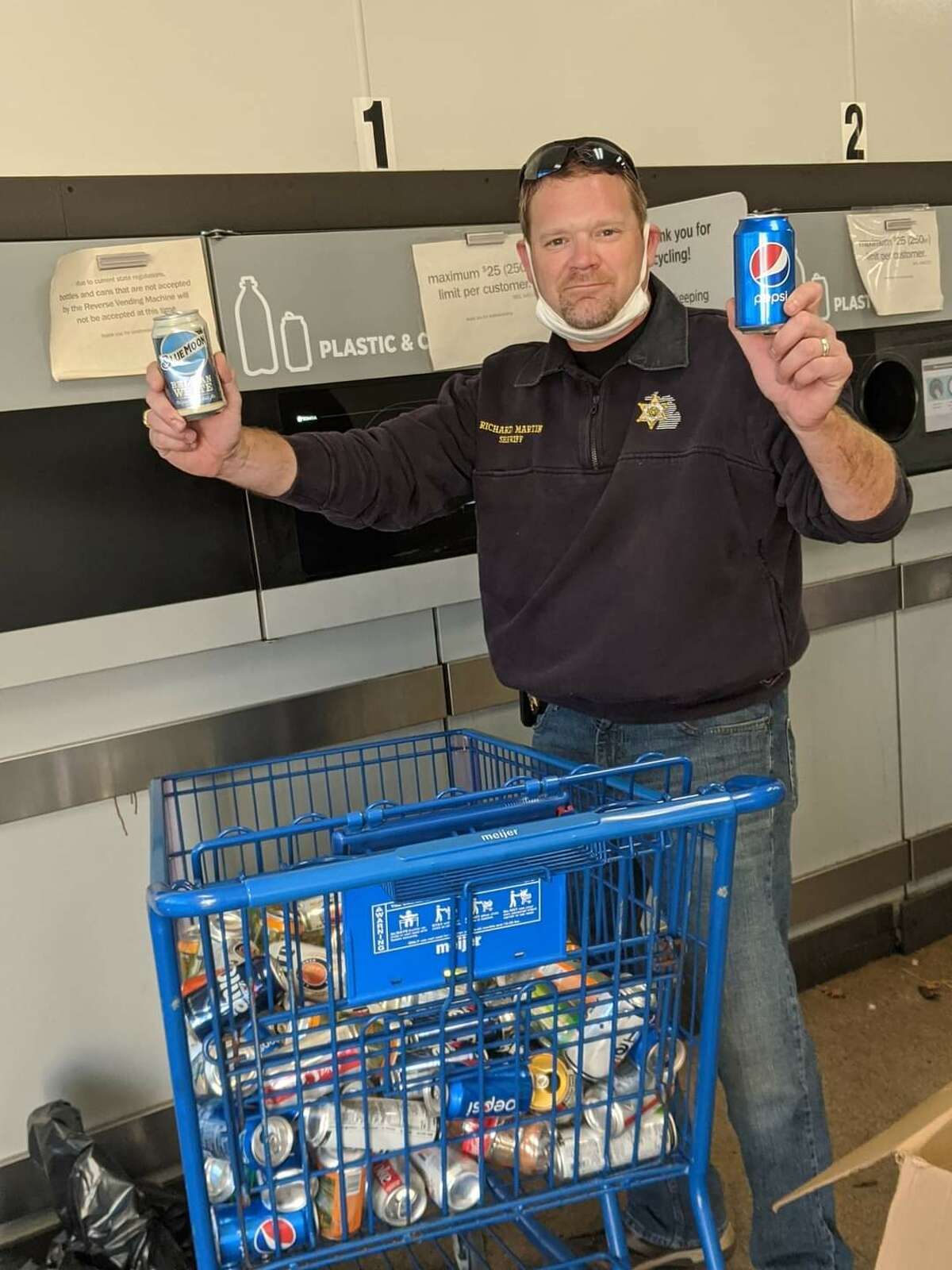 The Lake County Sheriff's Office will be picking up donations of cans and bottles to help support the LCSO Chritable Campaign, which supports local nonprofits. lake County Sheriff Rich Martin turns in donated cans and bottles.