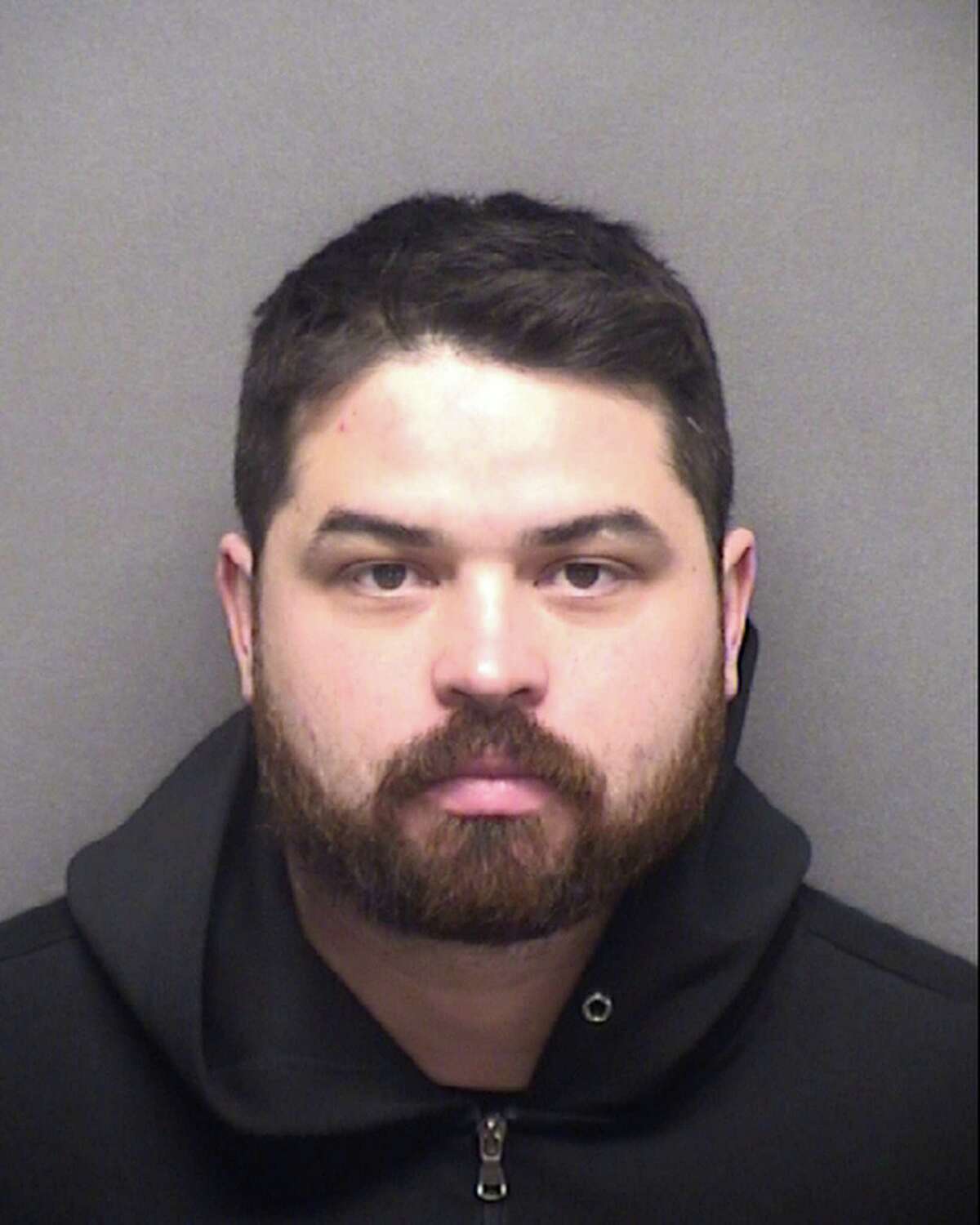San Antonio Police Department officer Gabriel Flores is seen in a Friday Feb. 3, 2023 booking photo provided by the Bexar County Sheriff’s Department. Flores was arrested for DWI, according to an SAPD press release.