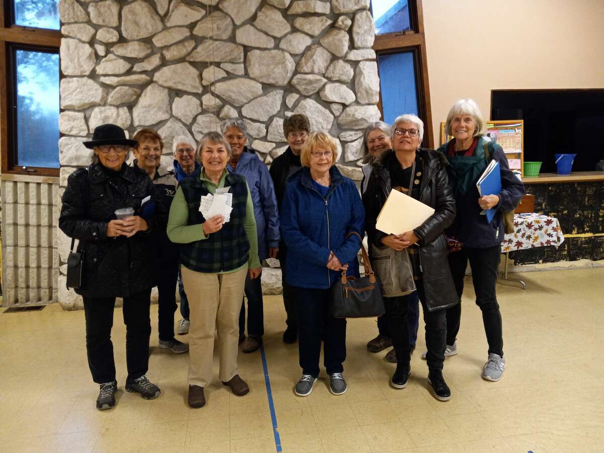 100 Women Who Care Manistee County meets four times a year to select a local charity to support. Members are shown gathering at the Wagoner Community Center in October. All 2023 meetings will take place at the Blue Fish Kitchen + Bar.