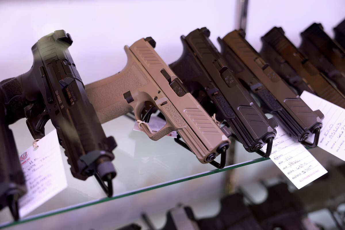 Handguns for sale at the WEX Gunworks store on Jan. 31, 2023, in Delray Beach, Fla. 