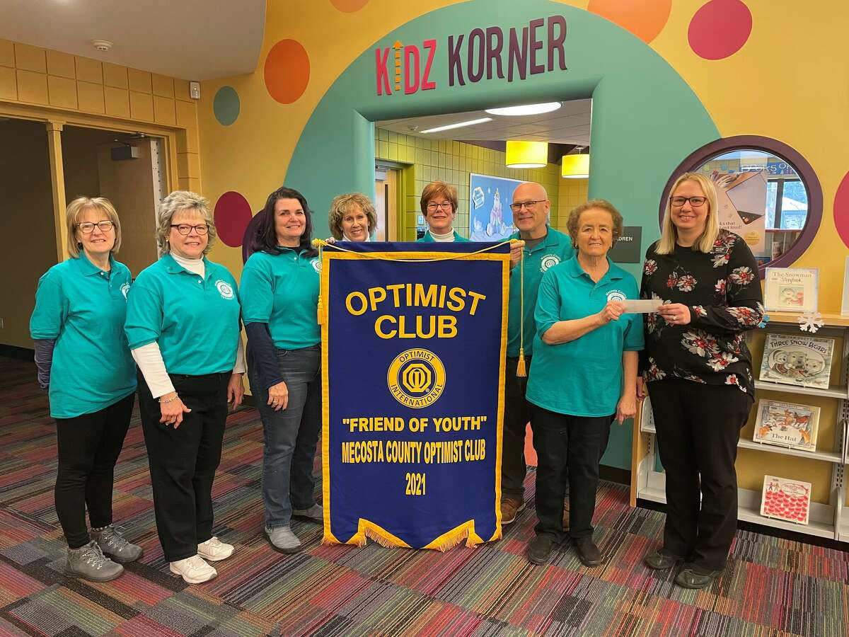 Mecosta County Optimists Club at the Morton Township library, where they donated $100 to help students buy books. An additional $100 was given to the Walter-Erickson library.