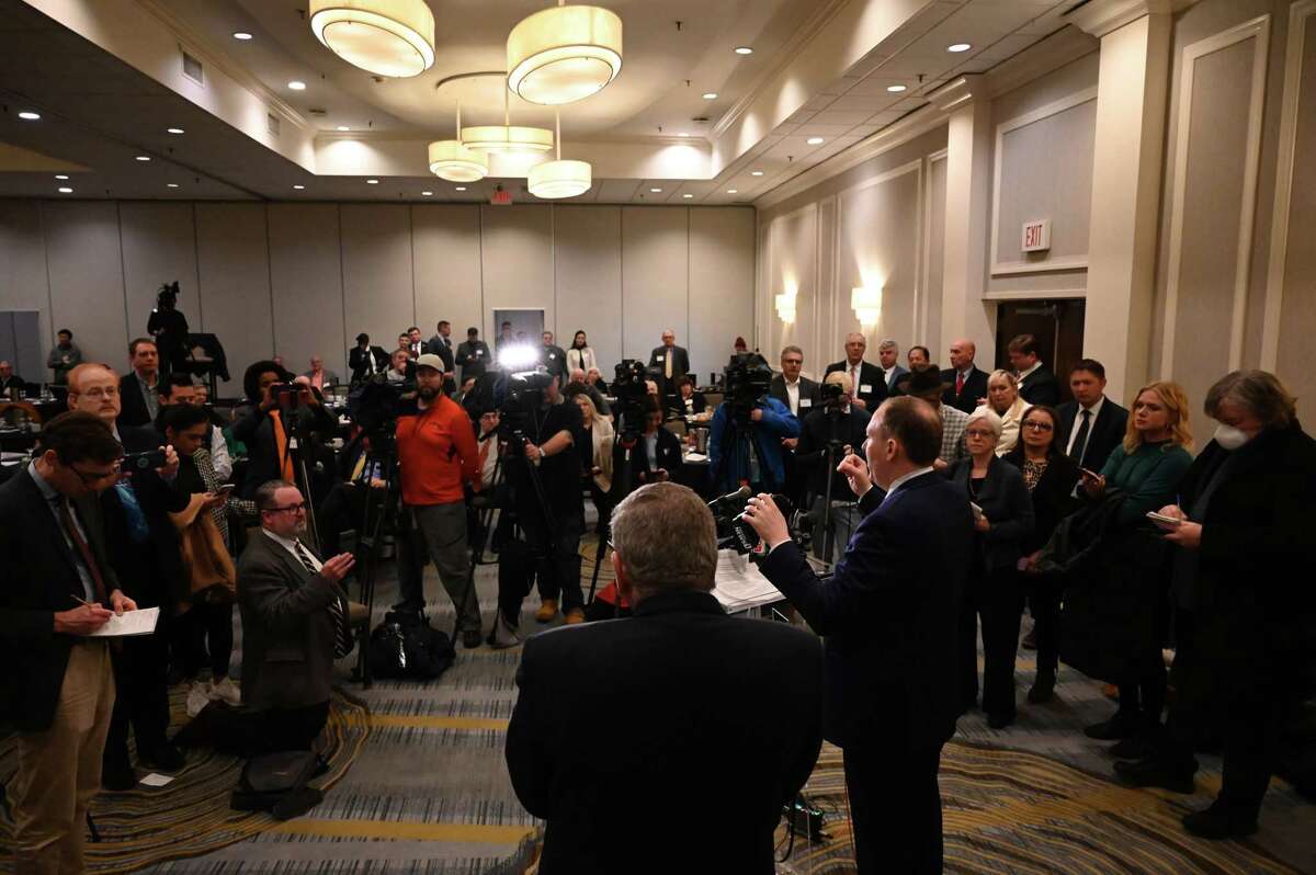 Lee Zeldin, former congressman and state gubernatorial candidate, center right, and New York Conservative Party Chairman Gerard Kassar, center left, hold a press conference during the Conservative Party of New York’s political action conference where Zeldin offered criticism of Gov. Kathy Hochul’s polices on Monday at the Albany Hilton in Albany.