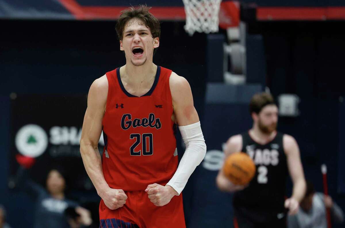 St. Mary's Gaels guard Aidan Mahaney (20) celebrates after scoring in overtime as the Gael wins 78-70 over Gonzaga at the University Credit Union Pavilion on Saturday, Feb. 4, 2023 in Moraga, Calif.