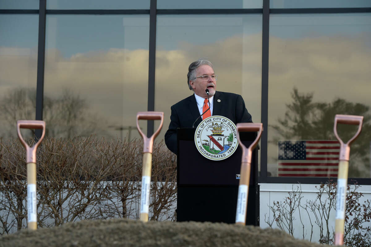 Mayor Dean Esposito speaks during the groundbreaking for the Danbury Career Academy at the former Cartus Corp. property. The 260,000-square-foot office building will be converted into a school expected to accommodate about 1,400 middle and high school students. The school is expected to open for the 2025-26 academic year. Monday, February 6, 2023, Danbury, Conn.