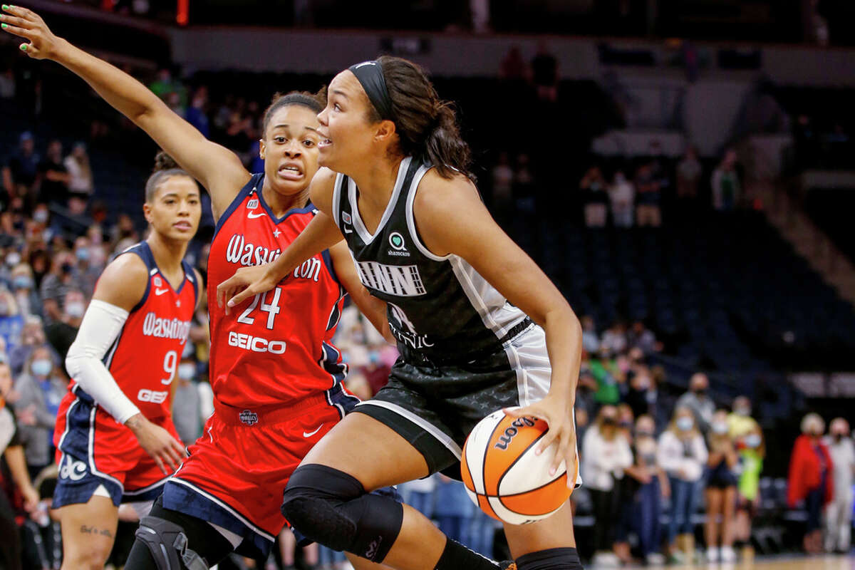 Los Angeles Sparks' Karlie Samuelson tries to pass during the second half  of a WNBA basketball game against the Minnesota Lynx Tuesday, June 20, 2023,  in Los Angeles. (AP Photo/Mark J. Terrill