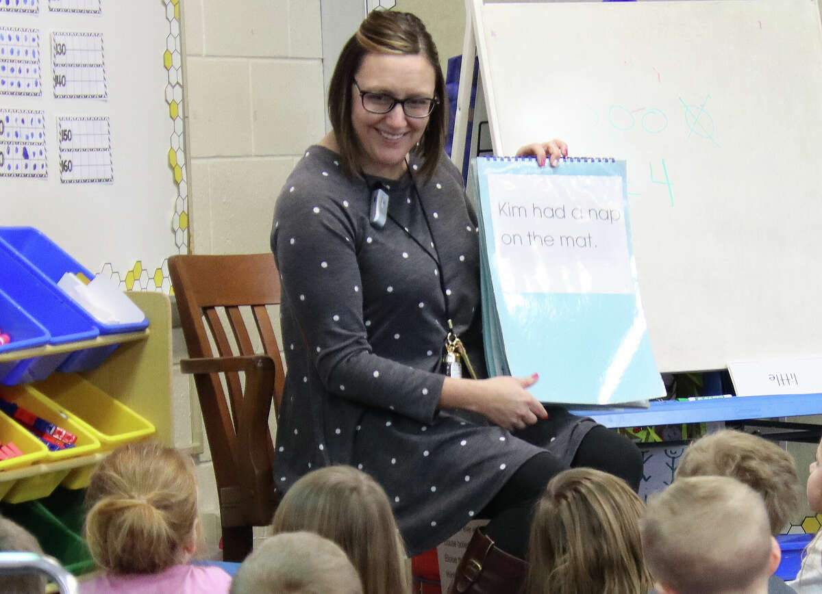 Bad Axe kindergarten teacher Terri Maurer leads her students through a lesson at Bad Axe Elementary School on Feb. 6.