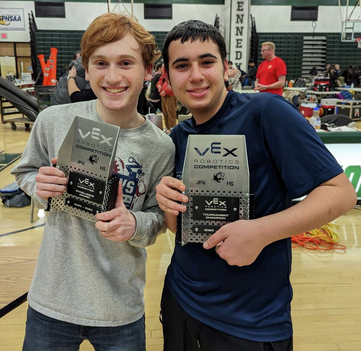 Harvey RoboCavs Blake Friedman of Cos Cob and his teammate Ben Zilberstein show their joy at winning the robotics tournament and receiving the prestigious Excellence Award.