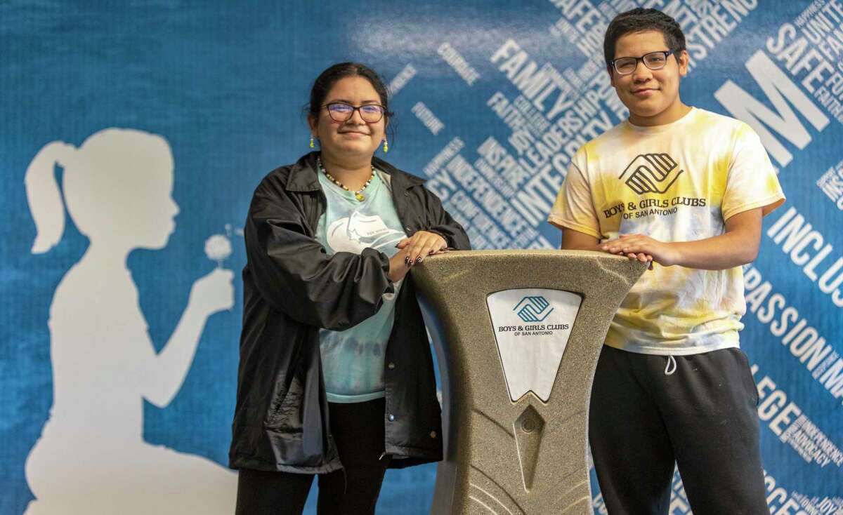 Emerald Alaniz and Philip Linan pose Friday, at the Mays Family Clubhouse of the Boys and Girls Club of San Antonio. The two have been named finalist for the organization’s Youth of the Year award.