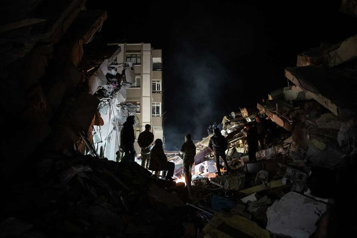 HATAY, TURKEY - FEBRUARY 07: Rescue workers work at the scene of a collapsed building on February 07, 2023 in Hatay, Turkey. A 7.8-magnitude earthquake hit near Gaziantep, Turkey, in the early hours of Monday, followed by another 7.5-magnitude tremor just after midday. The quakes caused widespread destruction in southern Turkey and northern Syria and were felt in nearby countries.