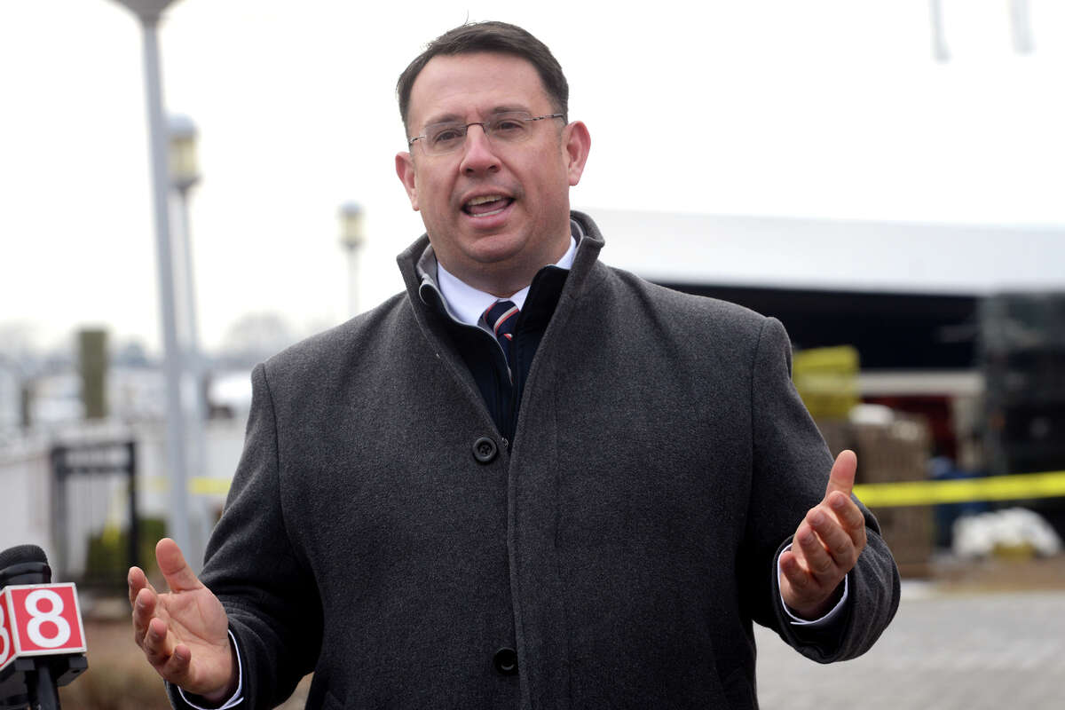 Mayor Ben Blake speaks during a news conference at Lisman Landing, in Milford, Conn. Jan. 25, 2022. Blake joined U.S. Sen. Richard Blumenthal, U.S. Rep. Rosa DeLauro Tuesday for the announcement of a $5 million federal grant to dredge Milford Harbor.