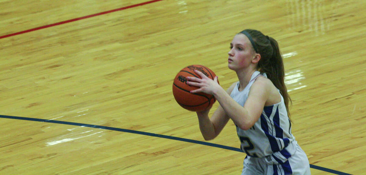 Onekama junior Ashlyn Blackmore attempts a free throw against Benzie Central on Feb. 7, 2023 at Onekama Consolidated Schools. 