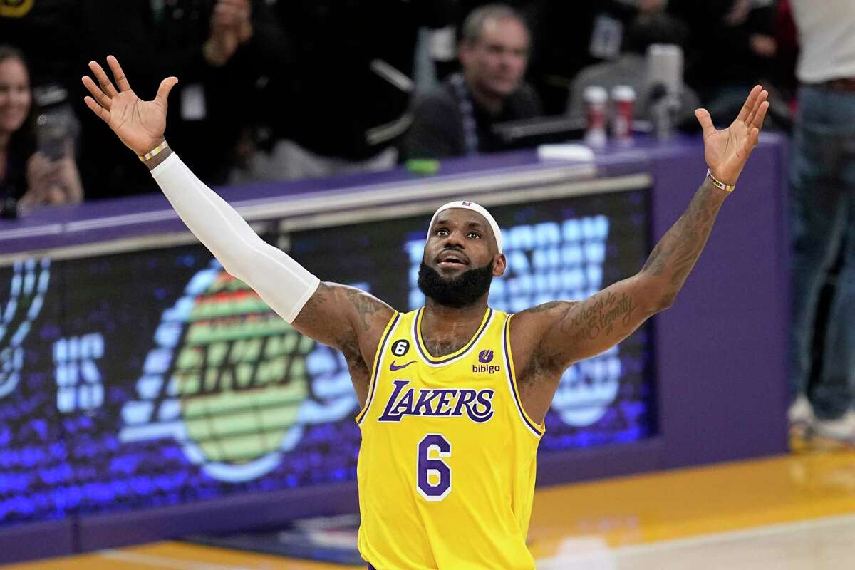Los Angeles Lakers forward LeBron James celebrates after scoring to pass Kareem Abdul-Jabbar to become the NBA's all-time leading scorer during the second half of an NBA basketball game against the Oklahoma City Thunder Tuesday, Feb. 7, 2023, in Los Angeles.