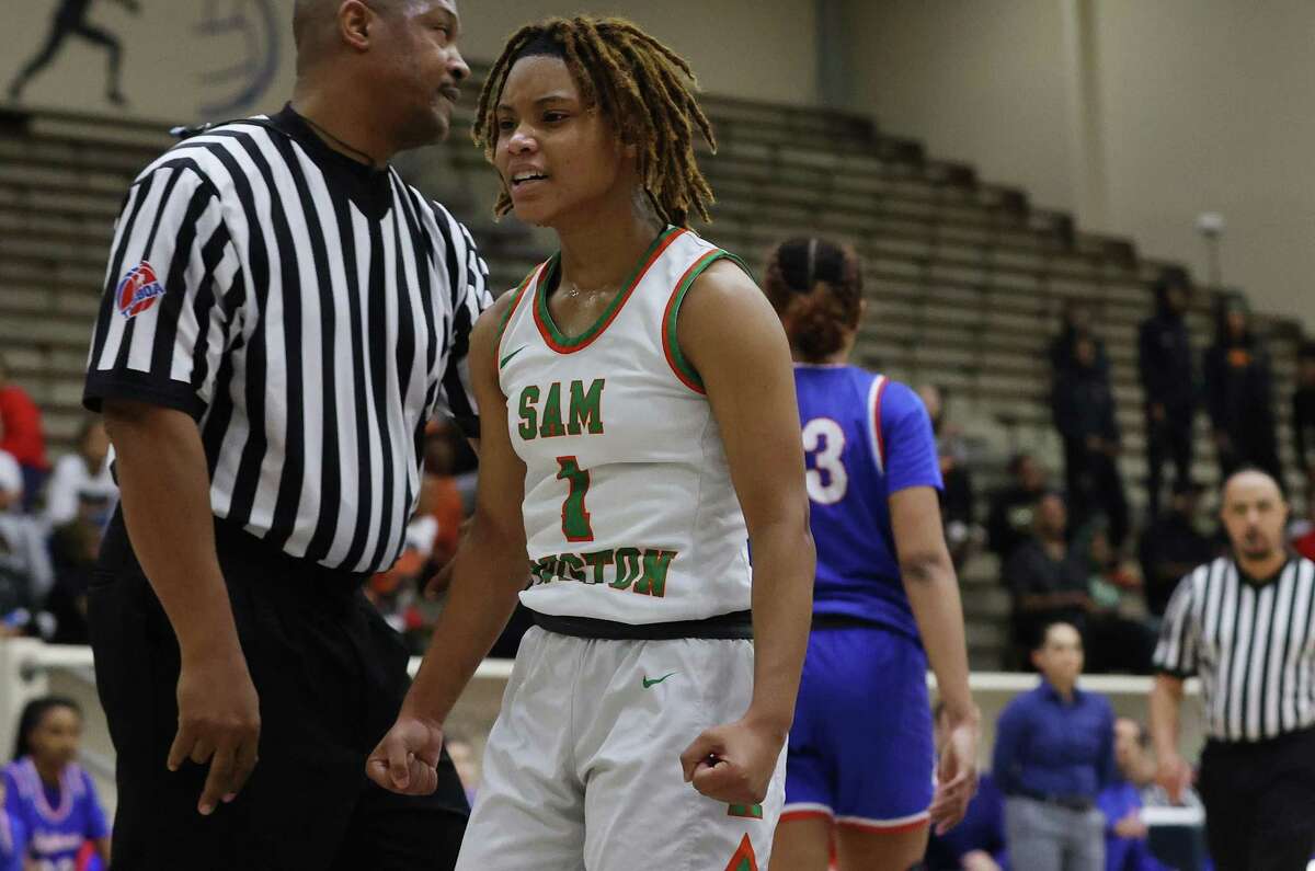 Sam Houston’s Cheyenne Mitchell (01) reacts after scoring on a foul against Jefferson during their girls basketball at Alamo Convocation Center on Tuesday, Feb. 7, 2023.