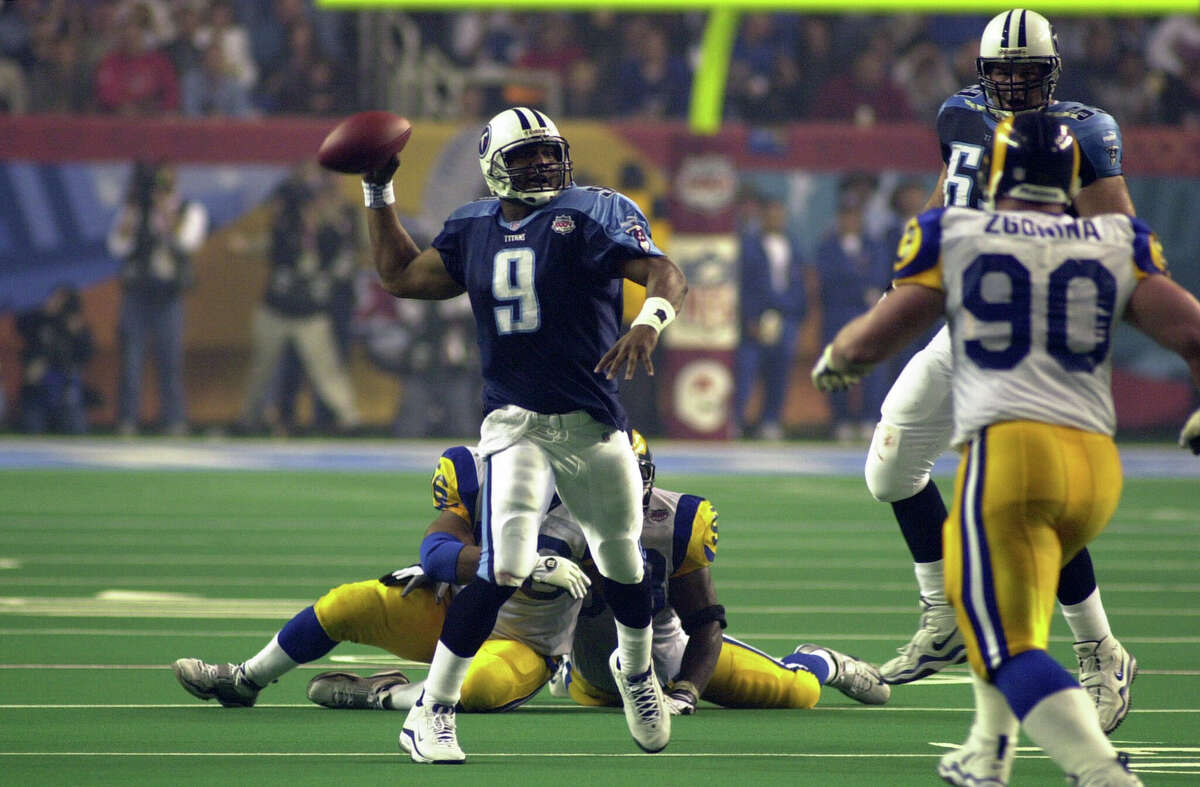 January 30, 2000: St. Louis Rams quarterback Kurt Warner #13 drops back to  pass against the Tennessee Titans in Super Bowl XXXIV (34). The Rams  defeated the Titans by the final score