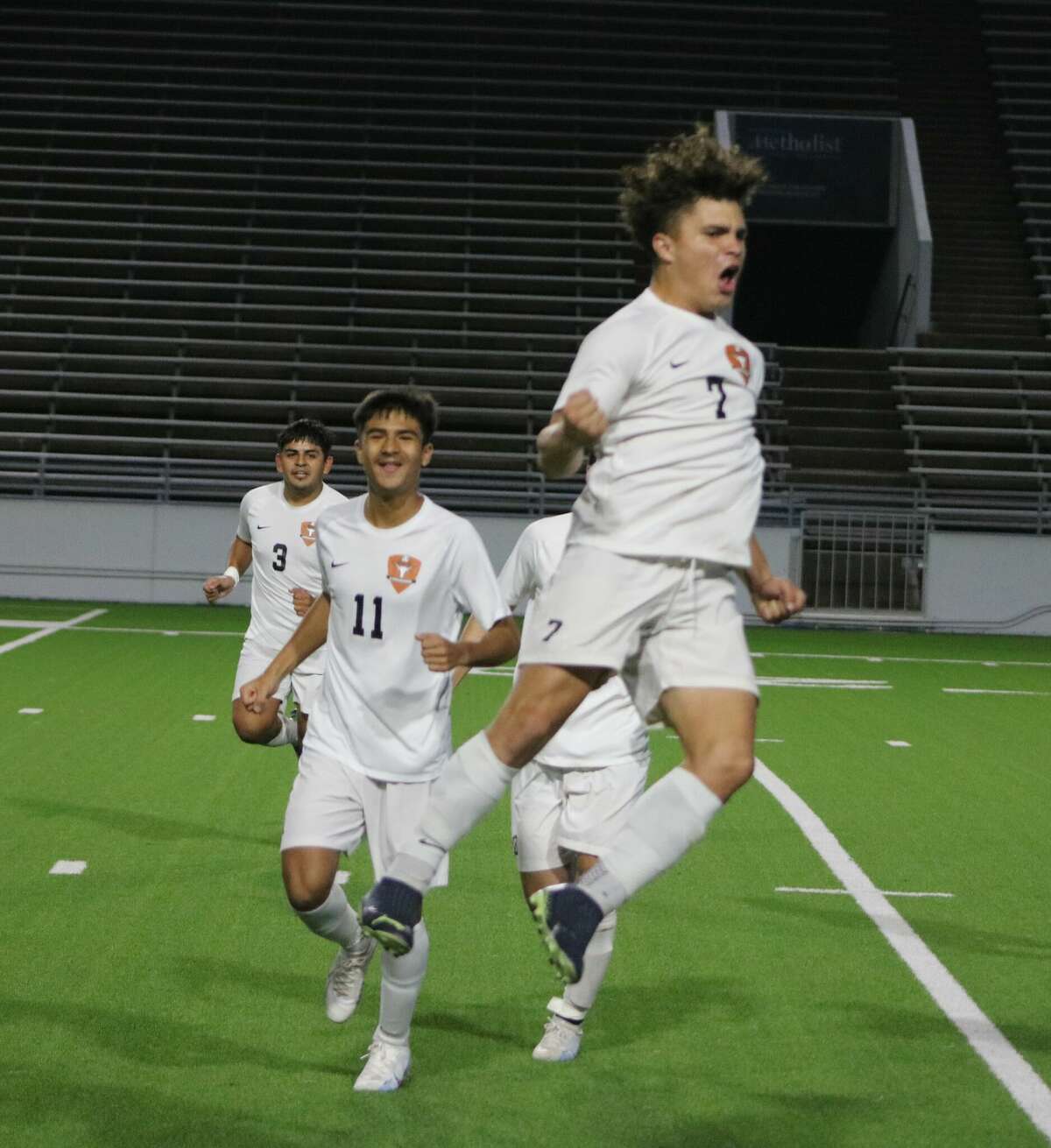 Dobie's Victor Hernandez (7) shows a tiny bit of excitement after scoring a goal in the opening minutes of Tuesday night's match in the "Enrique Brothers Bowl" 